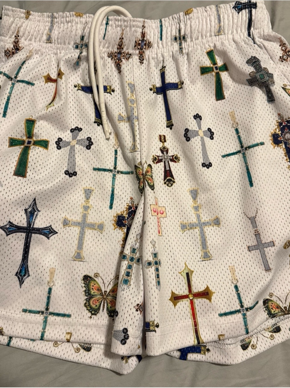 Bravest Studios White Athletic Shorts with Multicolor Cross & Butterfly Print
